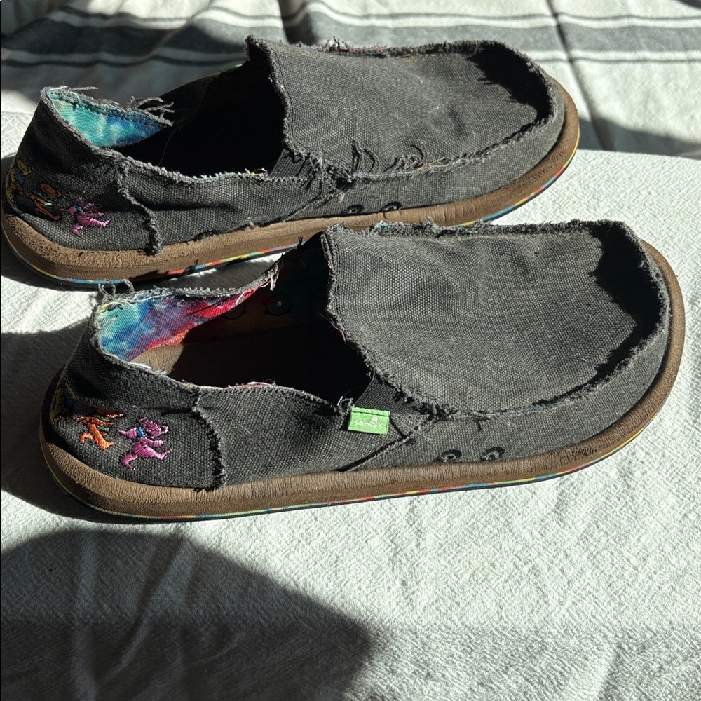 Sanuk Grateful Dead slip on shoes.